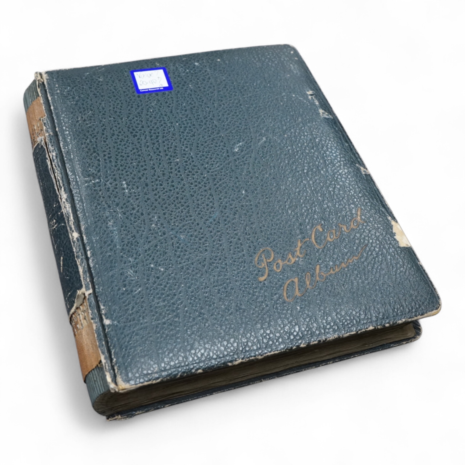 A postcard album containing early 20th century postcards, Gladys Cooper, comics, some photographs